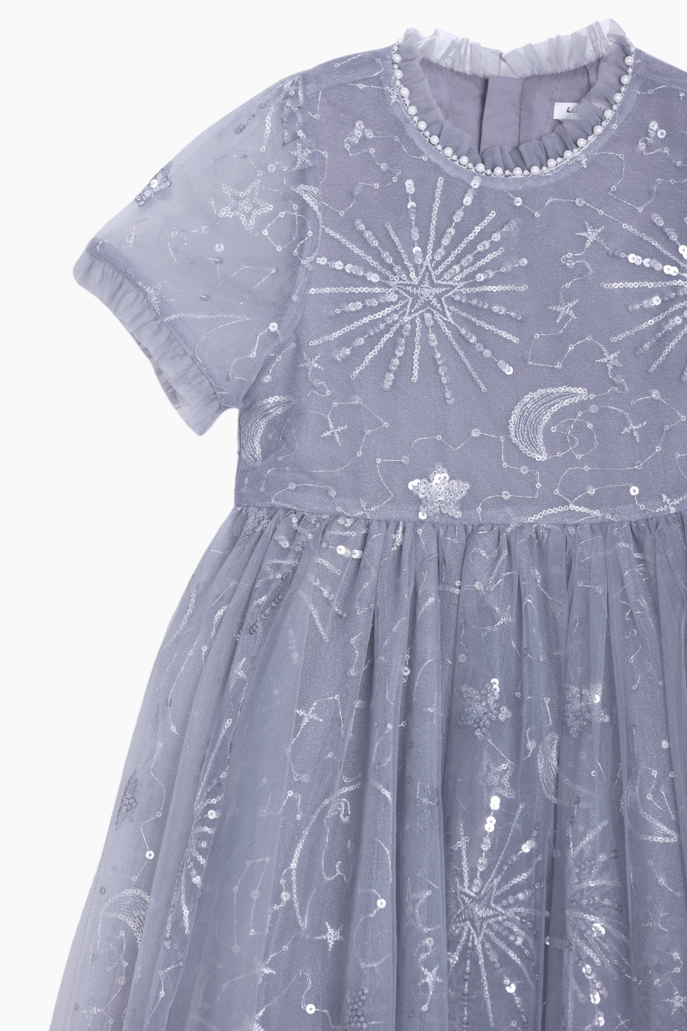 The KIKI and JOJO Girls Sequin Embroidered Tulle Dress - Starlight Silver features a short-sleeve design with celestial sequin and hand embroidery, a tulle overlay, and a round pearl-trimmed neckline.