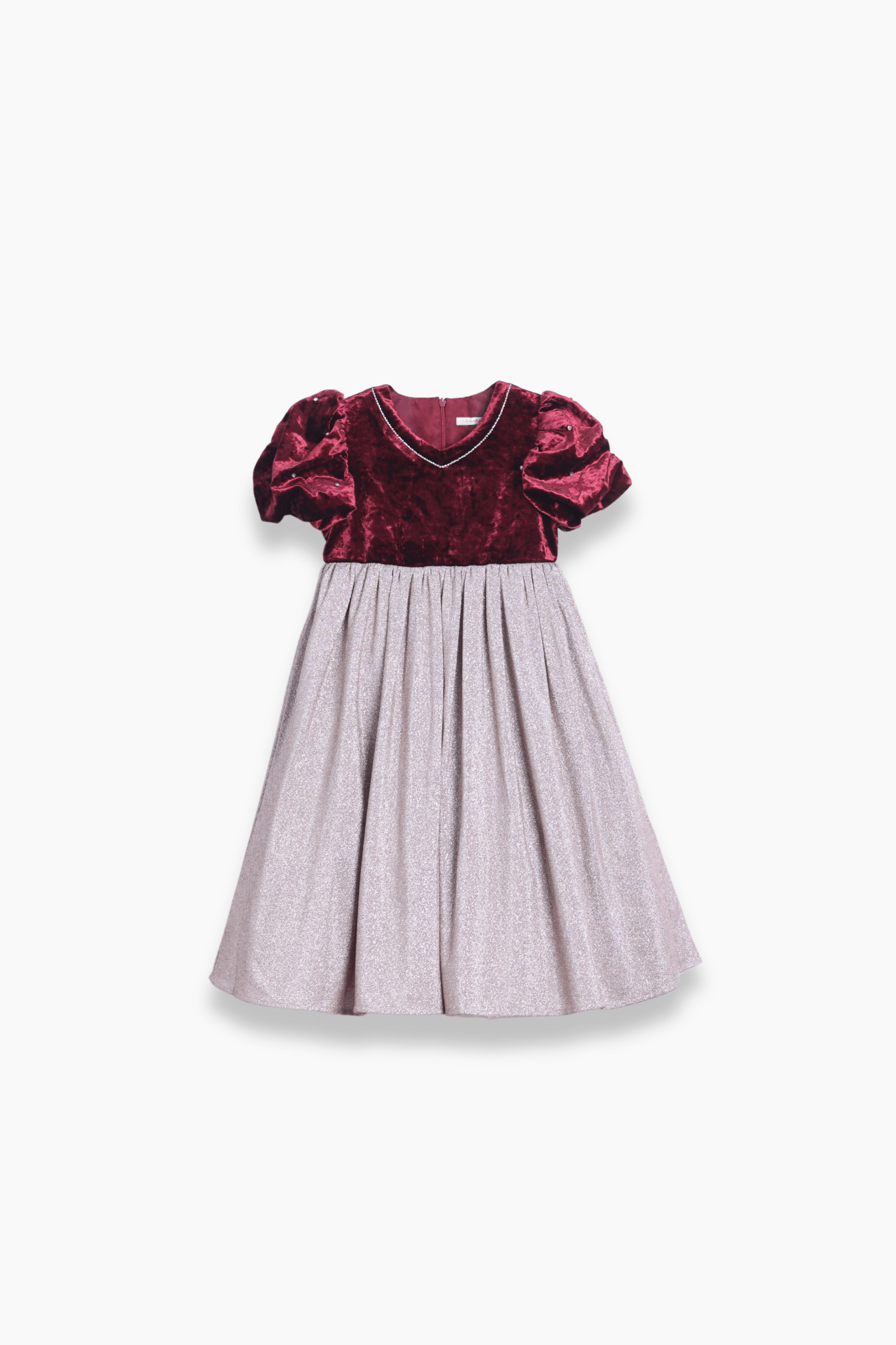 The KIKI and JOJO Girls Velvet Puff Sleeve Dress with Rhinestone Trim features a luxurious burgundy red velvet bodice, short puffed sleeves, and a sparkling full-length silver skirt—ideal for special occasions.