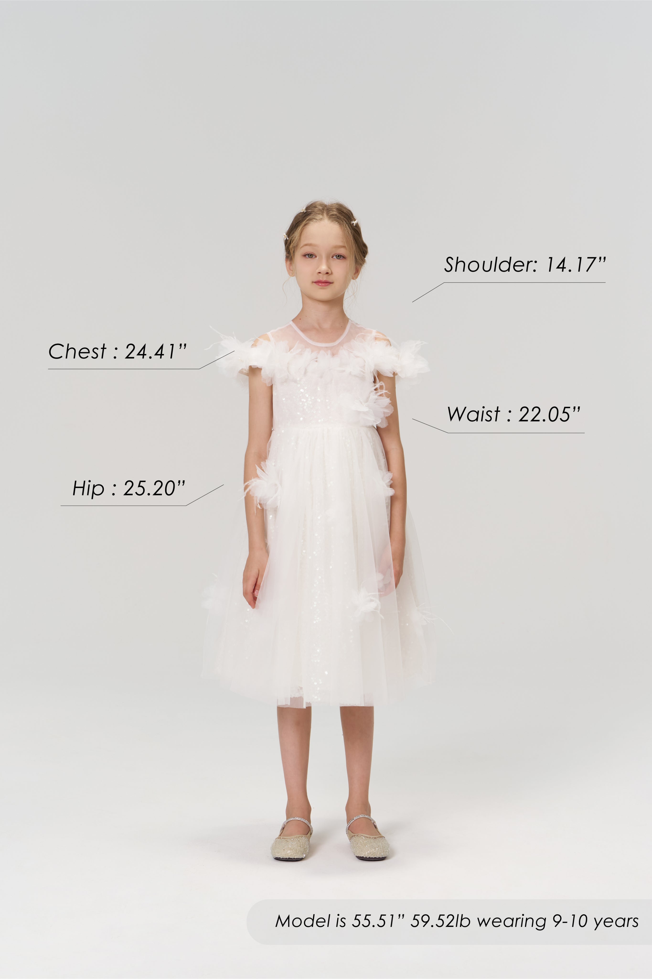 Young girl wears the KIKI and JOJO Feathered Whisper Dress - Blue with flats, posing against a plain background. Her body measurements, height, weight, and age are labeled to showcase an ethereal elegance look.