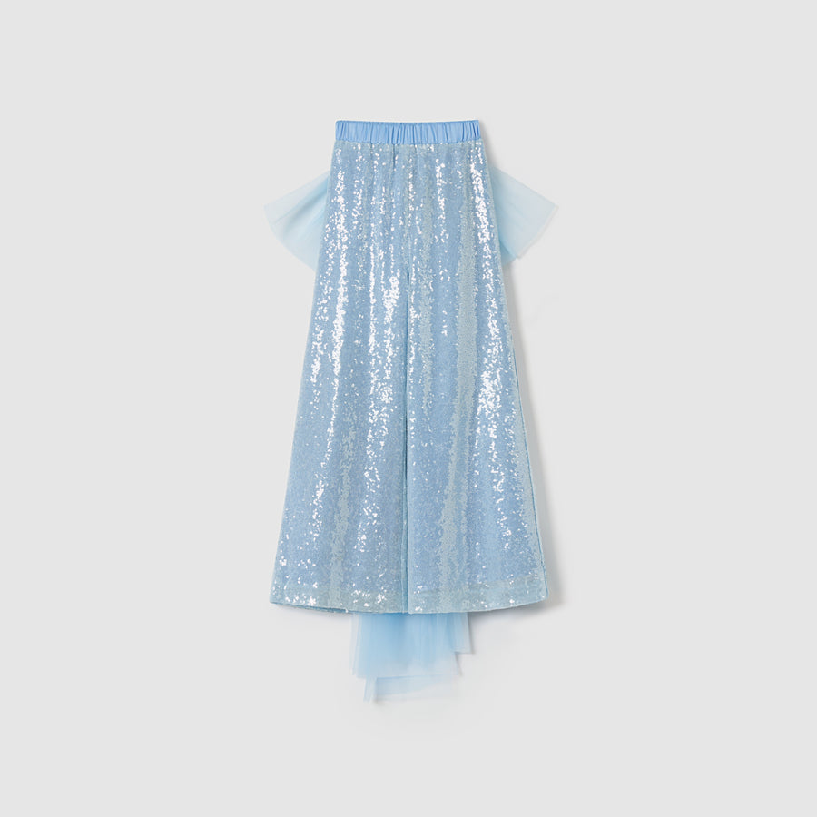 The KIKI and JOJO Radiance Sequin Wide-leg Pants feature a light blue sequin design, an elastic waistband, layered tulle accents, and a detachable bow, displayed against a plain white background.