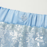 Close-up of the light blue elastic waistband with a clear button and sparkling sequin fabric on KIKI and JOJO’s Radiance Sequin Wide-leg Pants, showcasing their glamorous high-rise silhouette.
