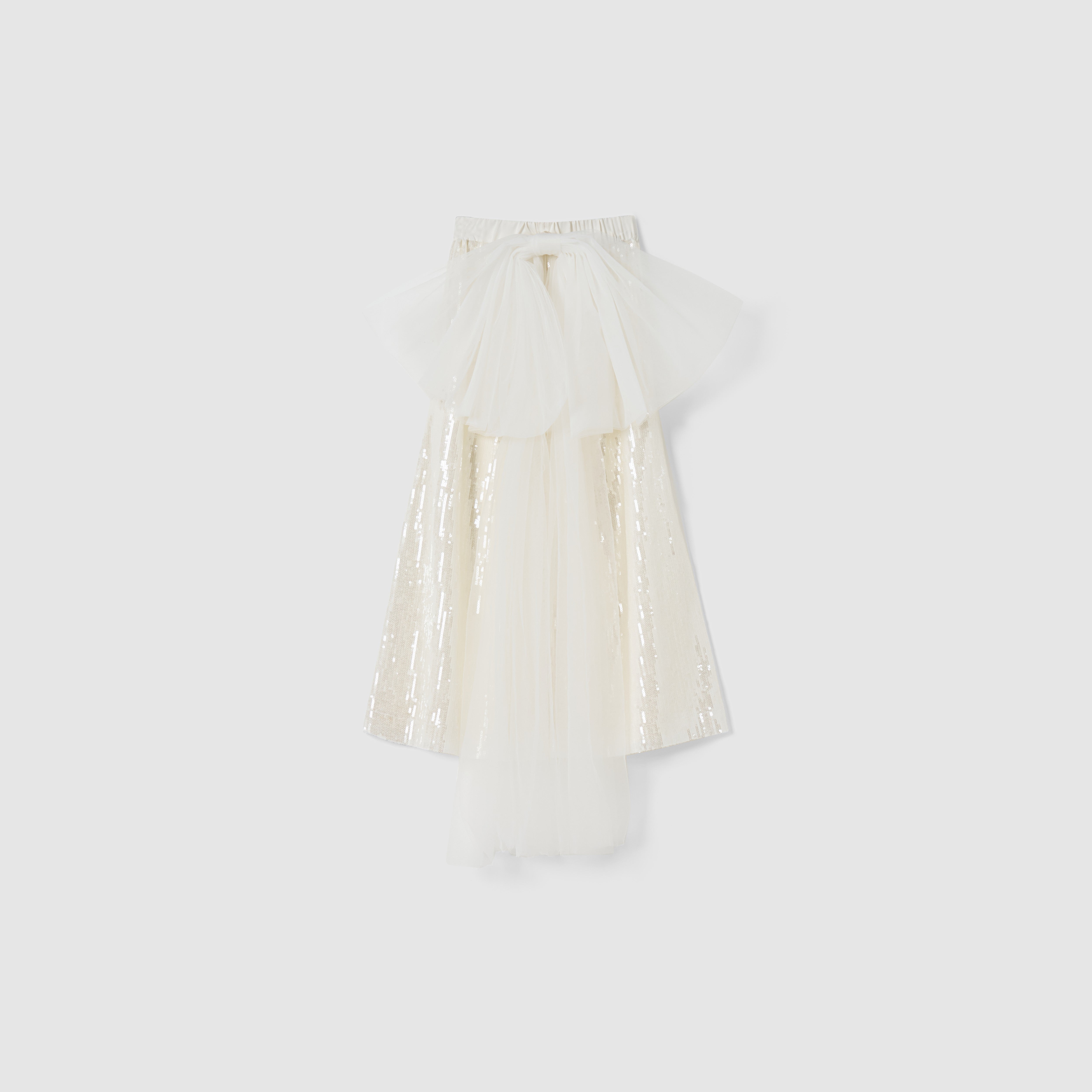 The Radiance Sequin Wide-Leg Pants by KIKI and JOJO feature a cream hue, shiny sequins, and a sheer tulle overlay, reimagining high-rise wide-leg pants in a flowing silhouette against a light gray background.