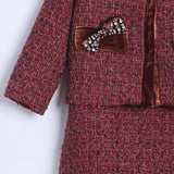 Close-up of the KIKI and JOJO Girls Tweed Jacket – Burgundy Velvet Pearl, showcasing a burgundy set with a brown velvet bow, velvet trim, and pearl-embellished pockets.