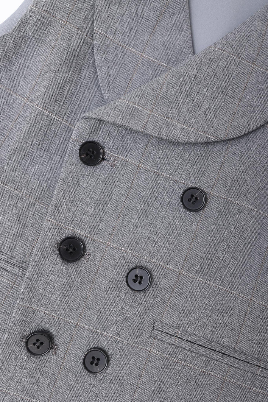 Close-up of the KIKI and JOJO Kids Suit – Gray 3-Piece Set (3-14 Years), featuring a checkered double-breasted blazer with black buttons and a notch lapel in a classic fit.
