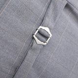 Close-up of a silver buckle on the Kids Suit – Gray 3-Piece Set by KIKI and JOJO, featuring classic-fit checkered fabric with subtle herringbone—ideal for stylish kids ages 3-14.