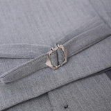Close-up of the KIKI and JOJO Kids Suit Vest in gray, featuring wrinkle-free herringbone fabric and an adjustable side tab for a classic fit (ages 3-14).