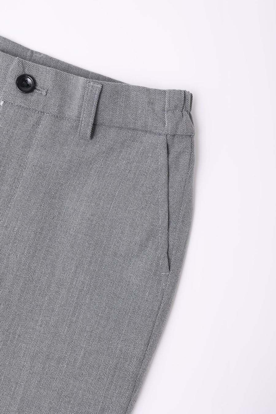 Close-up of the top of KIKI and JOJO Kids Suit – Gray 3-Piece Set (Classic Fit, Wrinkle-Free), showing dress pants with black button, belt loop, and side pocket, laid flat on white. For ages 3-14.