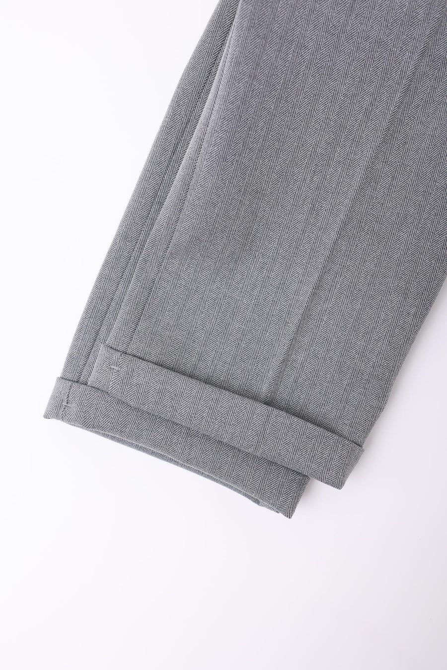 Close-up of the bottom hem and cuff of KIKI and JOJO Kids Suit Pants – Gray (Classic Fit, Wrinkle-Free), shown against a plain white background. Suitable for ages 3-14 years.