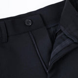 Close-up of KIKI and JOJO Kids Suit Pants – Black (Slim-Fit, Wrinkle Free) with the waistband unbuttoned and zipper partially open, showing the inner lining and a comfy elastic-banded waistband. For ages 3-14 years.
