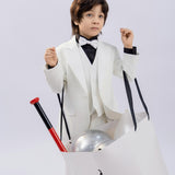 A boy wears the KIKI and JOJO Kids Dress Shirt – Black Long Sleeve (Classic Fit, 3-14 Years), standing with raised hands inside a breathable fabric bag, with a bat and silver balloons, against a plain light background.