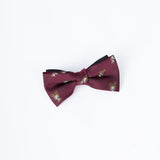 The KIKI and JOJO Kids Bow Tie – Burgundy Bear – Pre-Tied Satin – Adjustable features a charming small animal print with subtle bear embroidery, shown on a plain white background.