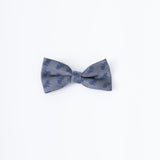 The KIKI and JOJO Kids Bow Tie – Light Gray Bicycle is a pre-tied, adjustable satin bow tie featuring bicycle embroidery on light gray fabric.