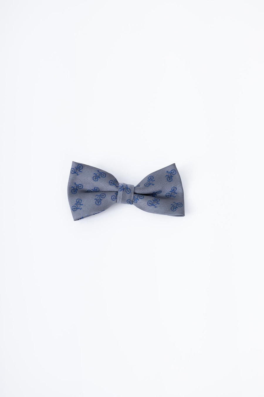 The KIKI and JOJO Kids Bow Tie – Light Gray Bicycle is a pre-tied, adjustable satin bow tie featuring bicycle embroidery on light gray fabric.
