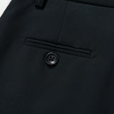 Close-up of KIKI and JOJO’s Noir Bloom Suit Pants for boys, featuring a straight-leg cut, tailored stitching, belt loops, and a black button—ideal for formal occasions.