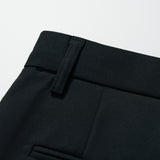 Close-up of the waistband and belt loop of KIKI and JOJO Noir Bloom Suit Pants for boys, showing a glimpse of the front pocket. Ideal for formal events. Displayed on a plain white background.