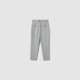 Back view of KIKI and JOJO Silver Bloom Suit Pants for boys featuring belt loops, an adjustable waistband, and two buttoned back pockets, laid flat on a plain white background.