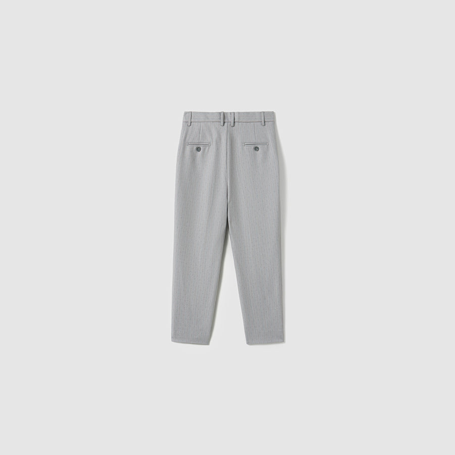 Back view of KIKI and JOJO Silver Bloom Suit Pants for boys featuring belt loops, an adjustable waistband, and two buttoned back pockets, laid flat on a plain white background.