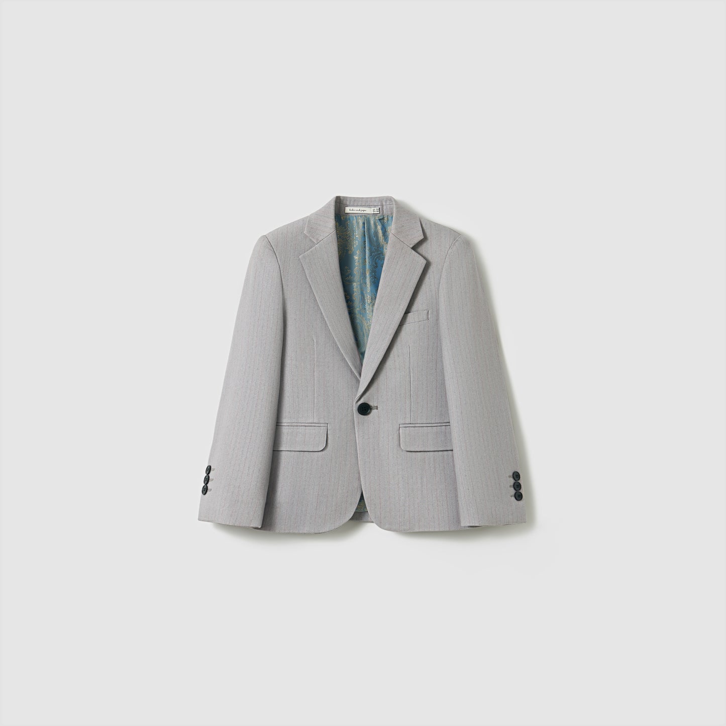 The KIKI and JOJO Silver Bloom Suit Jacket features light gray stripes, black buttons, two front pockets, and a chest pocket—ideal for boys’ formal wear. Displayed on a plain white background.