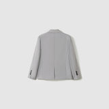 The KIKI and JOJO Silver Bloom Suit Jacket for boys is shown from the back in light gray stripes, featuring a center seam, two side vents, and buttoned cuffs—a stylish upgrade to any formal wardrobe.