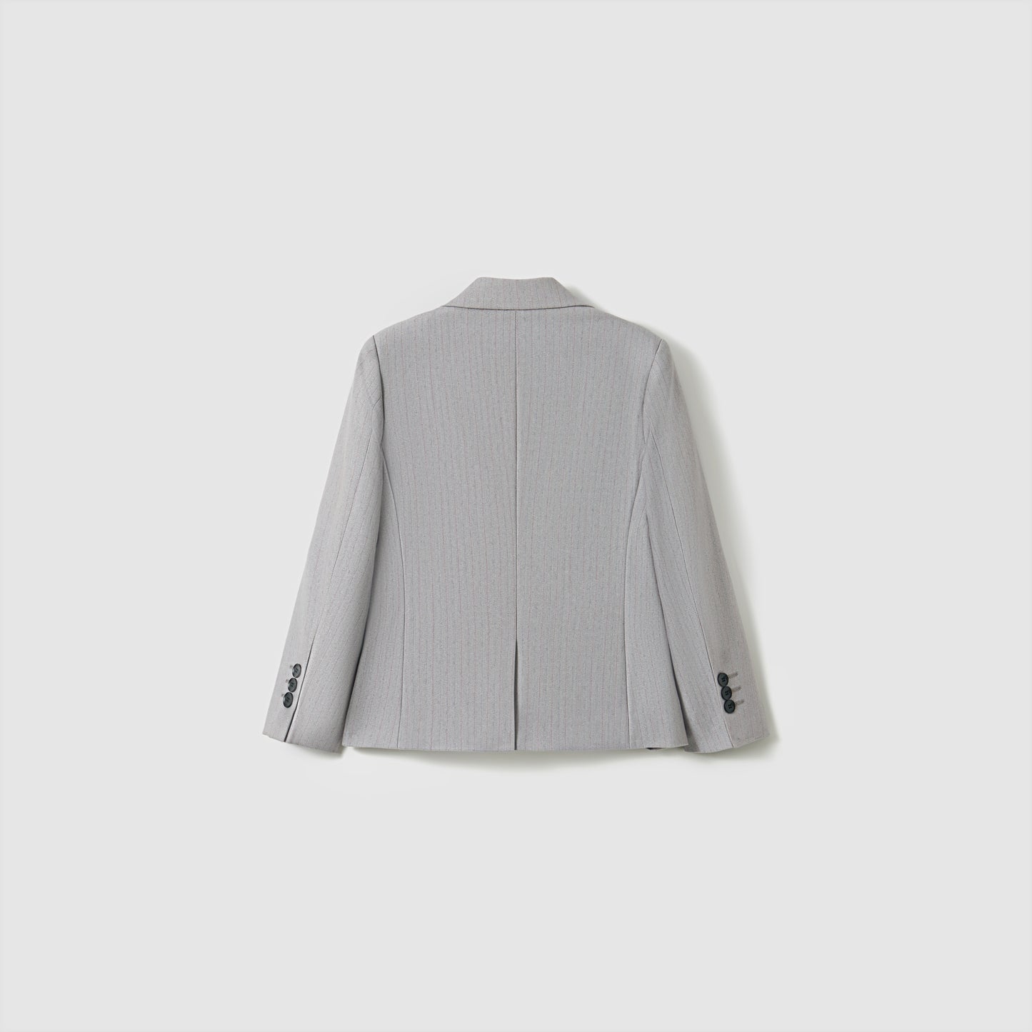 The KIKI and JOJO Silver Bloom Suit Jacket for boys is shown from the back in light gray stripes, featuring a center seam, two side vents, and buttoned cuffs—a stylish upgrade to any formal wardrobe.