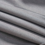 Close-up of the Silver Bloom Suit Vest by KIKI and JOJO: folded light gray fabric with subtle red and blue pinstripes, ideal for a classic boys' formal vest.