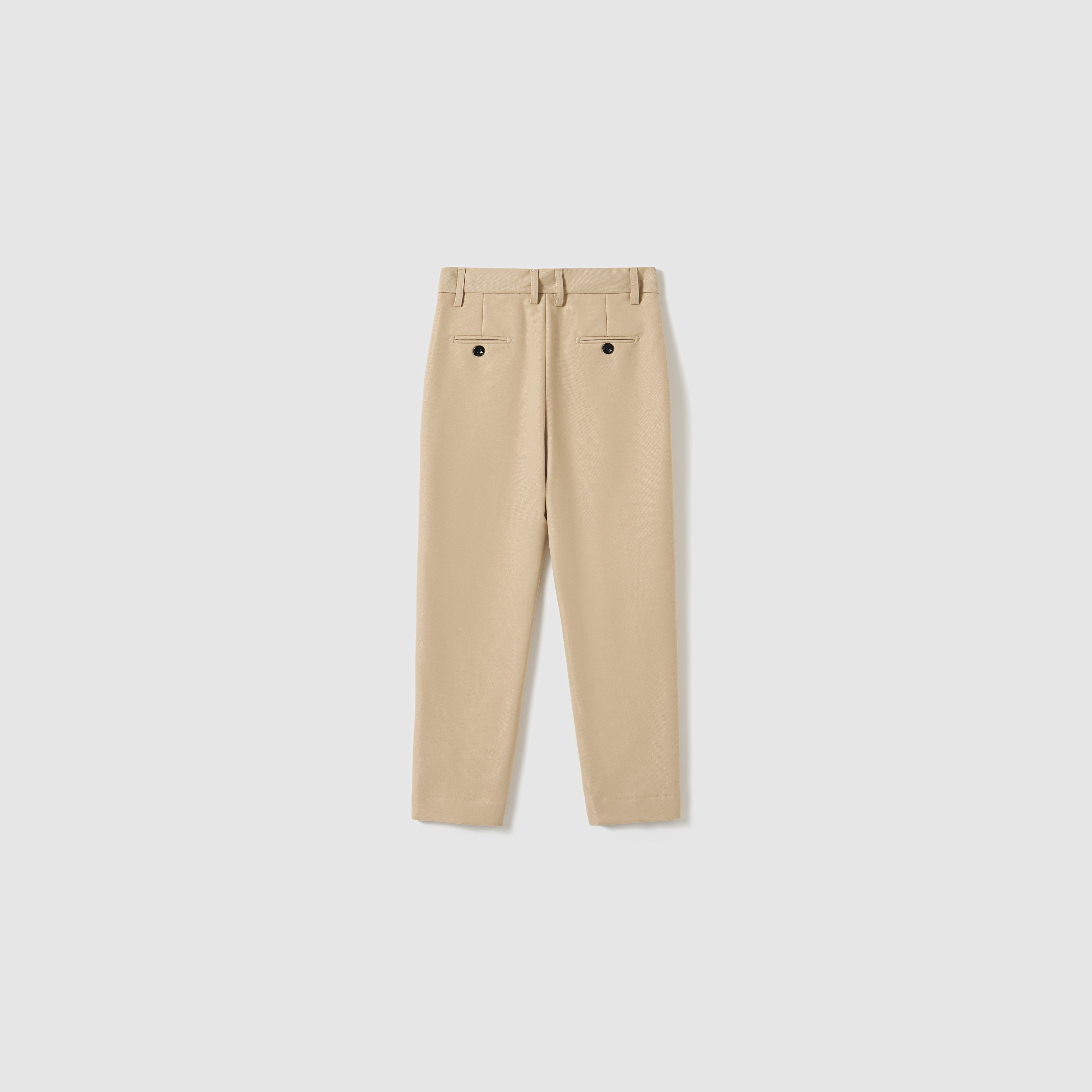 Savoy Dune Suit Pants by KIKI and JOJO shown flat from the back, with two rear buttoned welt pockets and an adjustable waistband for comfort.