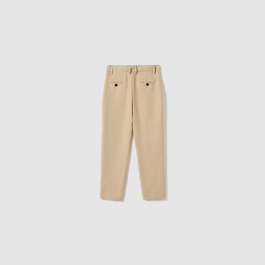 Savoy Dune Suit Pants by KIKI and JOJO shown flat from the back, with two rear buttoned welt pockets and an adjustable waistband for comfort.