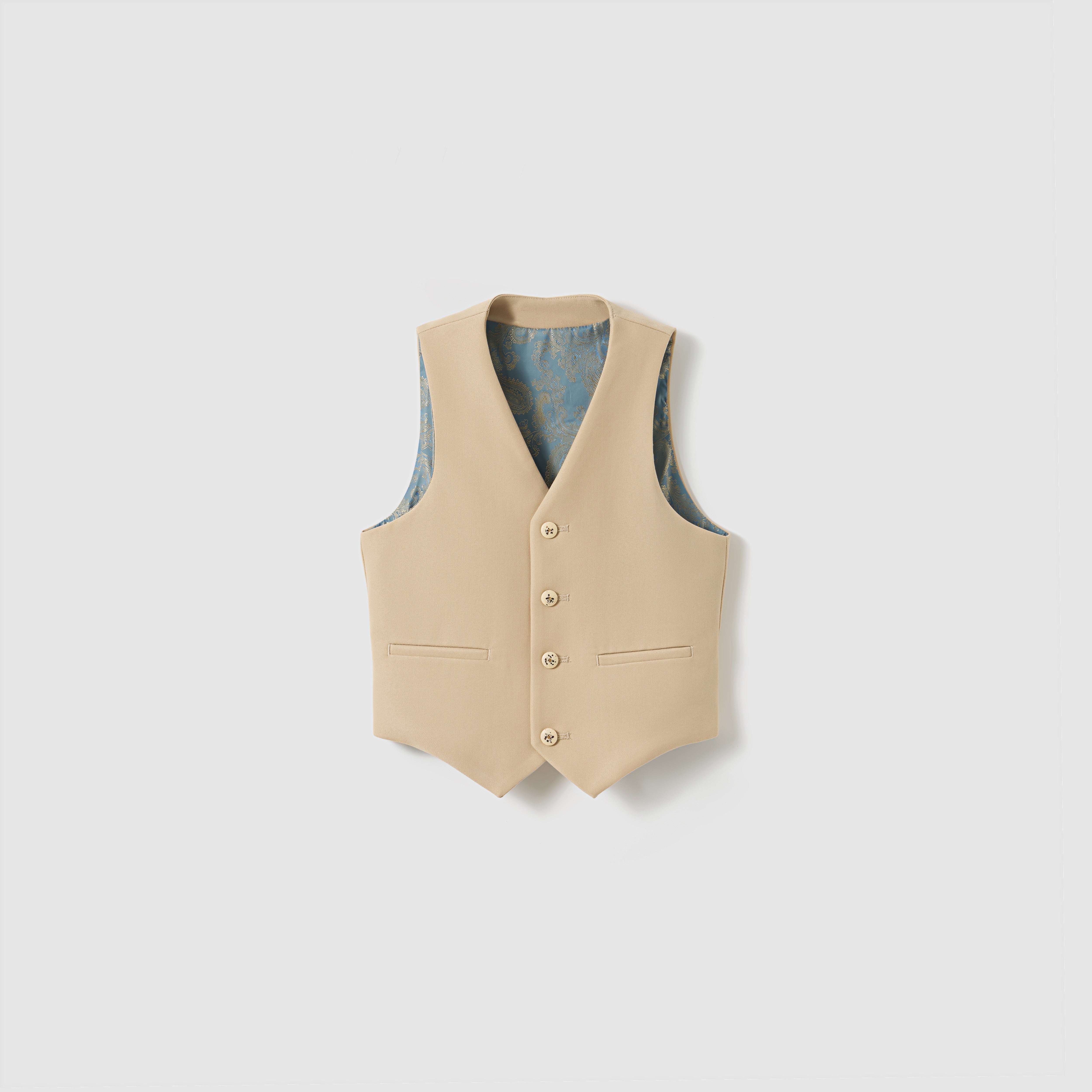 The Savoy Dune Suit Vest by KIKI and JOJO is a khaki beige boys' vest with a blue patterned inner lining, ideal for special occasions, shown against a plain light gray background.