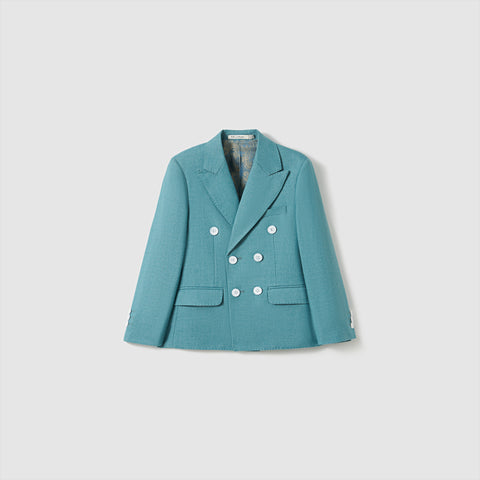 The Celeste Whimsy Suit Jacket by KIKI and JOJO, a celeste blue double-breasted boys' jacket with six white buttons and a notched collar, is displayed against a plain light background.