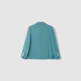 The Celeste Whimsy Suit Jacket by KIKI and JOJO is displayed from the back, showcasing a structured fit and white sleeve buttons against a simple light background.
