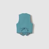 The Celeste Whimsy Suit Vest by KIKI and JOJO is shown from the back in peacock blue, with an adjustable strap and pointed hem against a plain light background—ideal for any formal look.