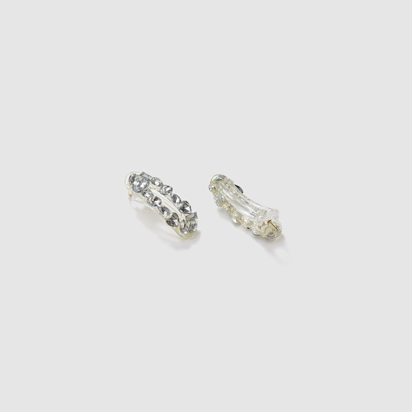 The KIKI and JOJO Girls Crystal Garden Barrettes—set of 2 sparkling clips with clear gemstones—are shown on a plain light gray background.