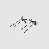 The KIKI and JOJO Girls Black Beaded Bow Hair Clips - Set of 2 features elegant black bows with long ribbon tails and rhinestone accents, displayed on a light gray background—ideal for gifting or adding sparkle to any hairstyle.