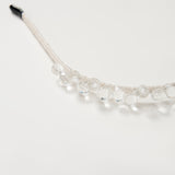 A close-up of the KIKI and JOJO Girls Crystal Bead Headband, featuring clear faceted beads, perfect as a flower girl accessory or birthday party hairpiece, displayed on a plain white background.