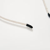 The KIKI and JOJO Girls Crystal Bead Headband features clear crystals, black tips, and decorative beads on one side—ideal for birthday parties or as a flower girl accessory. Shown on a white background.