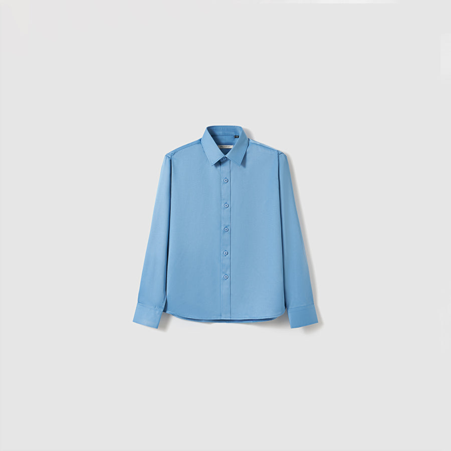The Boys Sky Blue Dress Shirt by KIKI and JOJO features long sleeves and a classic collar, shown against a plain white background.