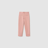 The Blush Reverie Suit Pants by KIKI and JOJO are blush pink boys' trousers featuring belt loops, an adjustable waistband, two buttoned back pockets, and neatly folded cuffs, displayed flat on a white background.