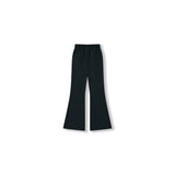 The Echo Whisper Dress Pants by KIKI and JOJO are black, high-waisted, wide-leg pants made from stretchy fabric with an elastic waistband and two back pockets, shown on a white background.
