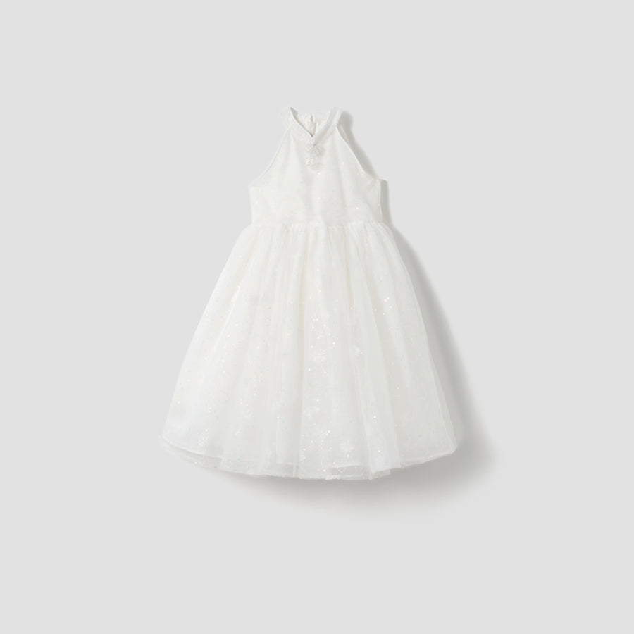 The Butterfly Whispers Dress by KIKI and JOJO features a sleeveless white halter top with butterfly details and a full, layered tulle skirt, shown against a plain light gray background.