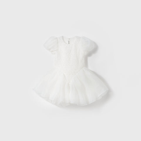 The Ballerina Whisper Dress by KIKI and JOJO is a white, short-sleeved baby ballet dress with a lace bodice, puffed tulle skirt, and beaded embroidery, displayed on a plain light background.