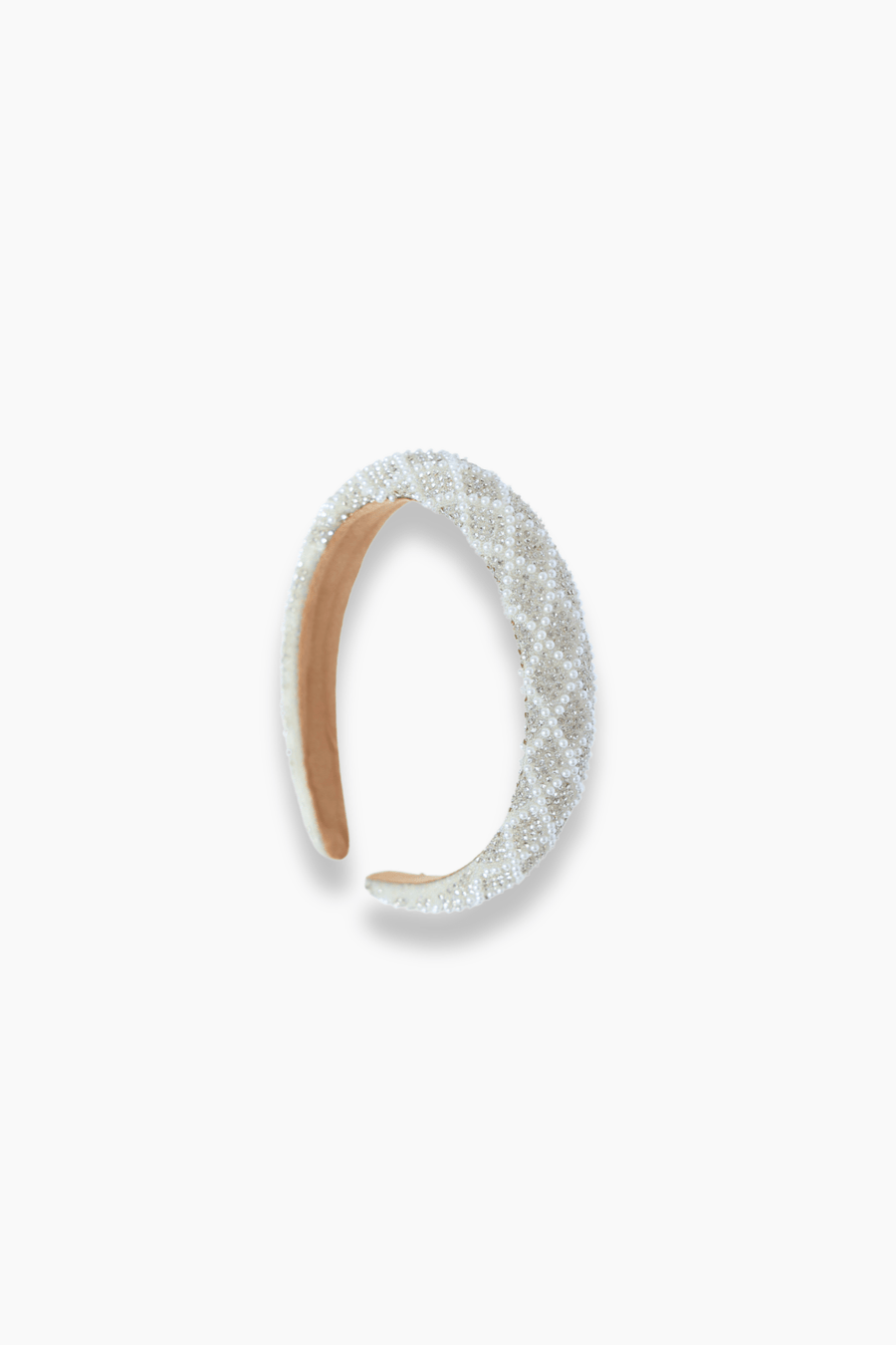 The KIKI and JOJO Girls Diamanté Padded Hairband in ivory, featuring sparkling diamantés and a quilted design, is displayed against a plain white background.