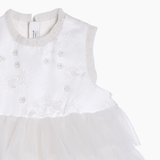 The KIKI and JOJO Girls Embroidered Satin & Tulle Dress in ivory features floral embroidery on the bodice and a layered embroidered tulle skirt, perfect for special occasions, displayed against a plain background.