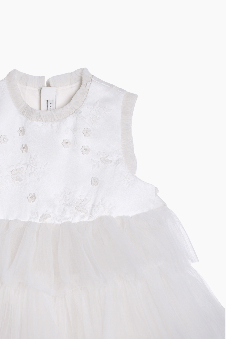 The KIKI and JOJO Girls Embroidered Satin & Tulle Dress in ivory features floral embroidery on the bodice and a layered embroidered tulle skirt, perfect for special occasions, displayed against a plain background.