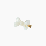 The KIKI and JOJO Girls Iridescent Sheer Double Bow Hair Clip in ivory adds playful elegance with its gold clasp, shown beautifully against a plain white background.