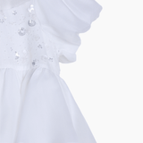 Close-up of the KIKI and JOJO Girls Pearl-Embroidered Satin Dress in Pure White, featuring sheer layered ruffles and hand-embroidered pearls with sequins on the bodice—ideal as a flower girl’s gown.