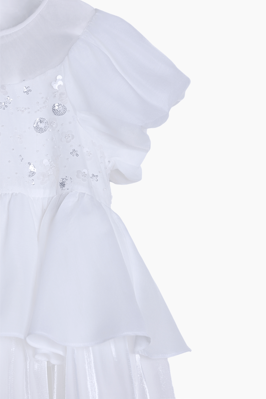 Close-up of the KIKI and JOJO Girls Pearl-Embroidered Satin Dress in Pure White, featuring sheer layered ruffles and hand-embroidered pearls with sequins on the bodice—ideal as a flower girl’s gown.