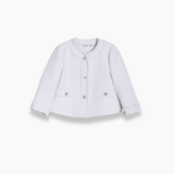 The KIKI and JOJO Girls Pearlescent Elegance Tweed Jacket in Soft Champagne is a white, long-sleeve, button-up jacket with two front pockets and decorative trim, displayed on a plain white background.