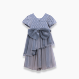 The Girls Velvet Asymmetrical Hem Puff Sleeve Dress in gray by KIKI and JOJO features puff sleeves and a stylish asymmetrical hem, beautifully displayed on a white background.