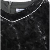 The KIKI and JOJO Girls Velvet Puff Sleeve Dress in Forest Green features a back zipper and rhinestone trim along the neckline—an elegant choice for special occasions.