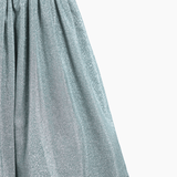 The KIKI and JOJO Girls Velvet Puff Sleeve Dress with Rhinestone Trim in forest green features elegant puff sleeves and sparkling accents, shown from the waist down against a white background—ideal for special occasions.